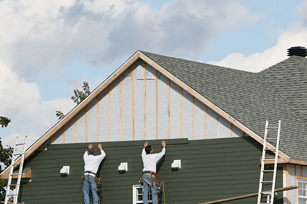 Professional Siding Replacement technician working in Morganville, NJ